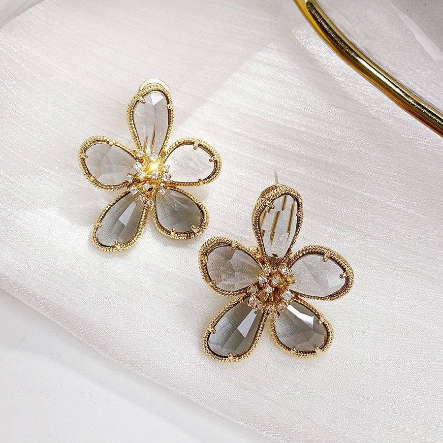 Wealth Flower Zirconia Encrusted Rotated Earrings 0